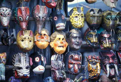 Full frame shot of various masks for sale at street market