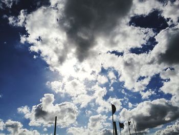 Low angle view of street light against sky