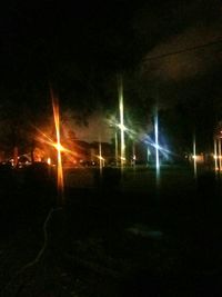 View of illuminated street light at night