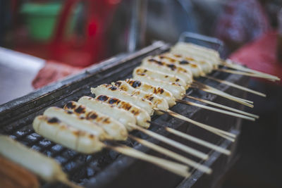 Close-up of meat on barbecue grill