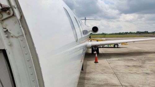 Boarding a bombardier type airplane on a sunny morning at one of the international airport