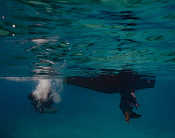 Man swimming in pool