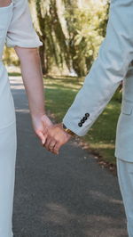 Wedding day hand holding