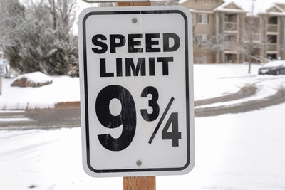 Information sign on road during winter