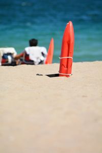 Woman sitting on beach