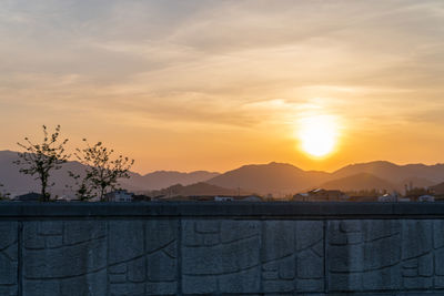 Scenic view of mountains against sky during sunset