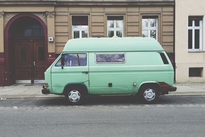 Caravan parked in front of house