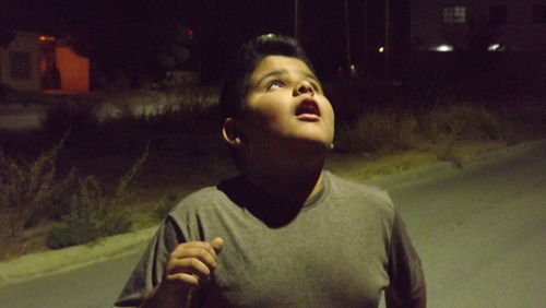 Portrait of a beautiful young woman looking away