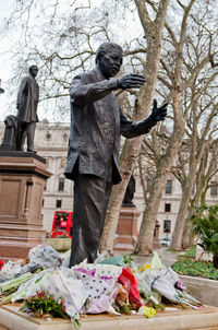 Low angle view of statue against building