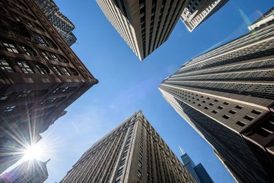 Low angle view of skyscrapers against sky