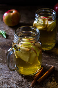 Close-up of drink in glass jar on table