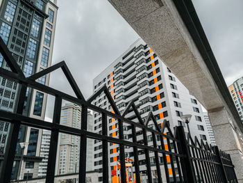 Low angle view of modern buildings against sky