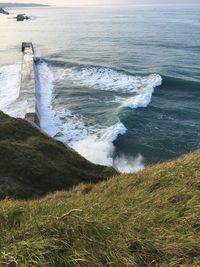 High angle view of waves on beach