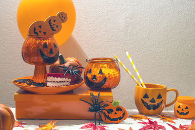 View of pumpkin on table against wall