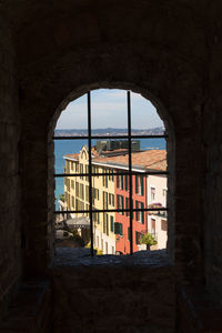 View of cityscape through window