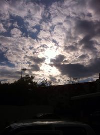 View of road against cloudy sky