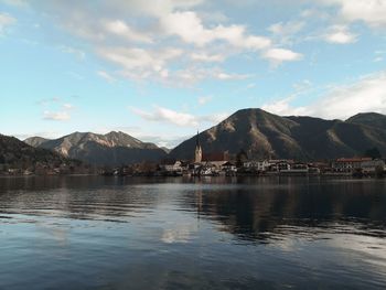 Scenic view of lake and mountains against sky