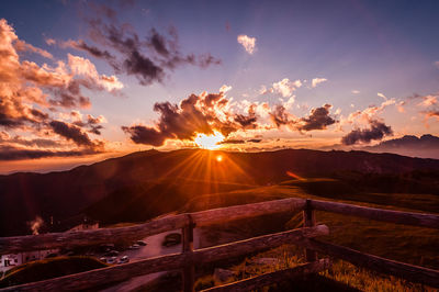 Scenic view of mountains against sky during sunset