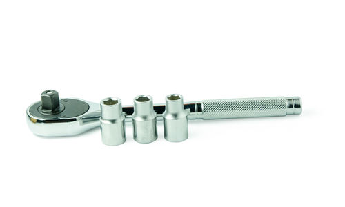 High angle view of machine part against white background