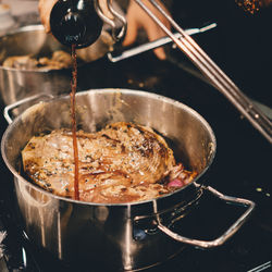 Close-up of meat in cooking pan