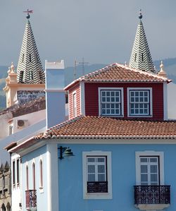 Blue house against sky