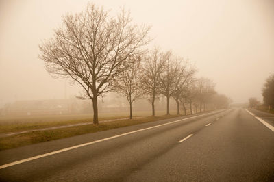 Empty road in foggy weather