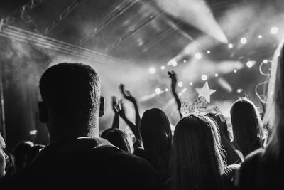 Rear view of people at music concert