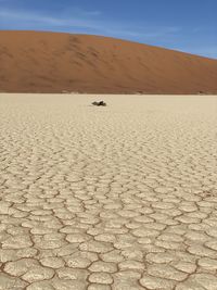 Scenic view of desert against sky