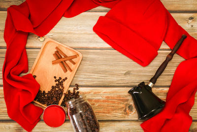 High angle view of red bottles on table