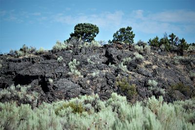 Scenic view of rocky mountains against sky