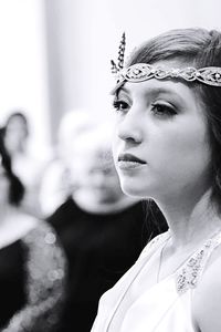 Close-up of beautiful bride looking away