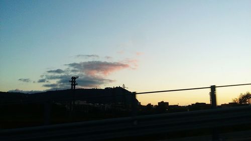 Silhouette of building at sunset