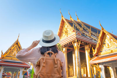 Low angle view of temple against building