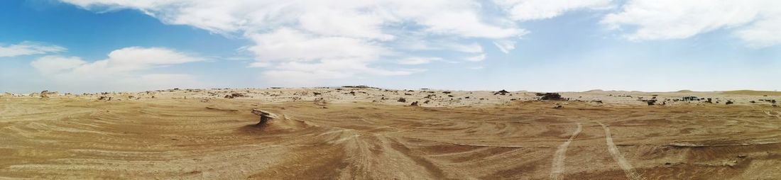 Panoramic view of desert against sky