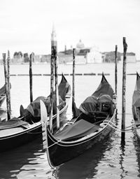 Boats moored in canal