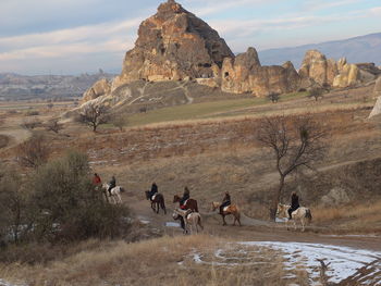 Group of people on rock formation