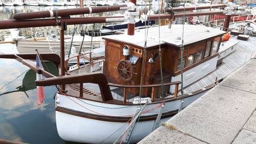 High angle view of boats moored at harbor
