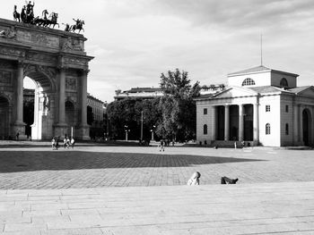 People walking on street in city