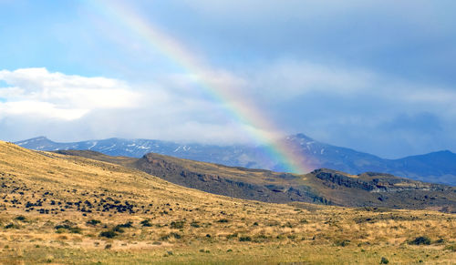 Scenic view of rainbow against sky