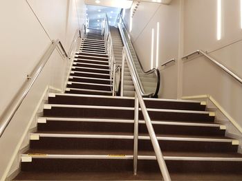 Low angle view of escalator in building