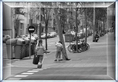 Full length of woman walking in city