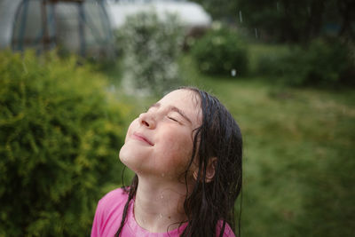 Close-up of wet girl outdoors