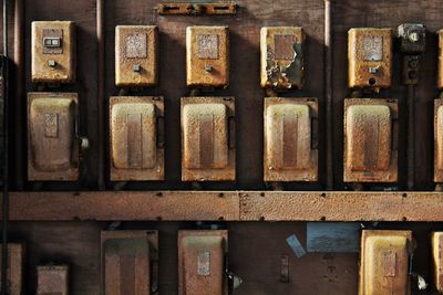 Full frame shot of abandoned fuse boxes