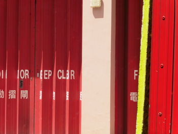 Close-up of text on red door