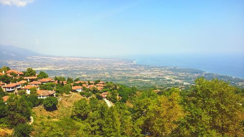 Scenic view of landscape against blue sky