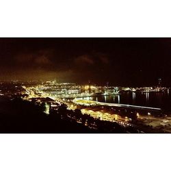 Illuminated cityscape at night