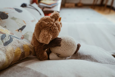 Stuffed toy on bed at home