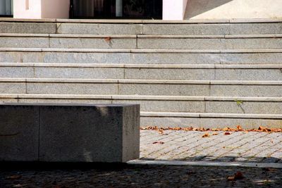 Close-up of metal railing on footpath