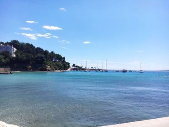 View of beach against blue sky