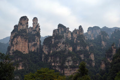 Panoramic view of rock formations against sky